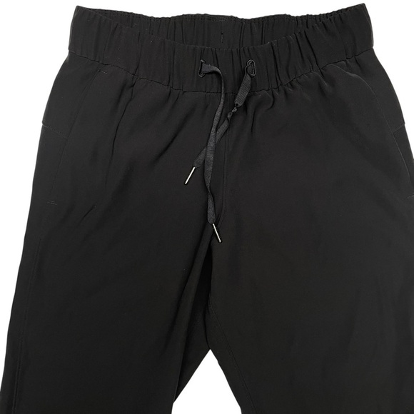 LULULEMON On The Fly Crop Woven Black Pants Size 4 - Picture 8 of 14